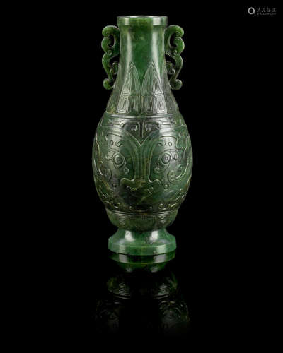 18th/19th century A spinach green jade archaistic pear-shaped vase