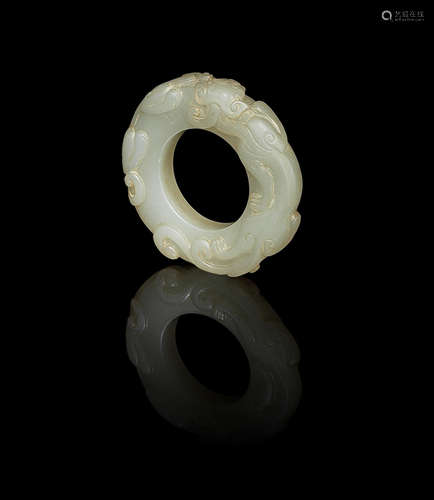 A pale green jade 'chilong' ring