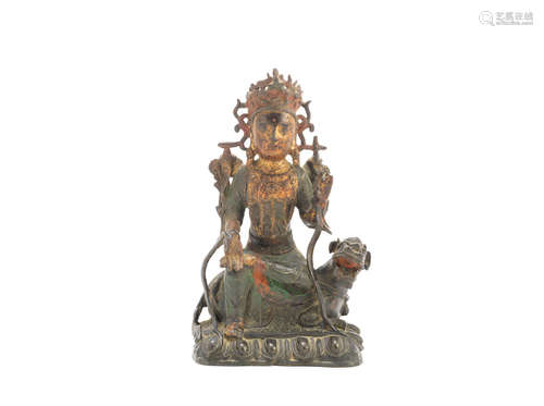 Ming Dynasty A parcel gilt and painted bronze figure of a Bodhisattva