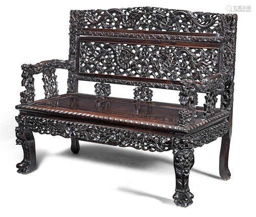 19th century A carved hongmu 'dragon' bench