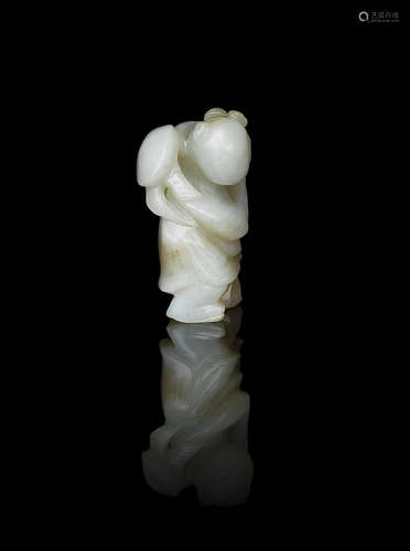 Ming Dynasty A pale green jade carving of a boy