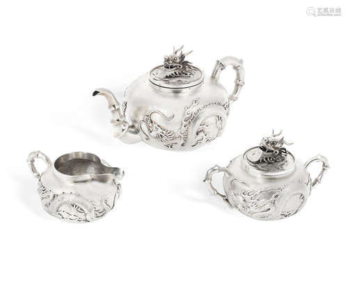 Wang Hing stamped marks, Late 19th/early 20th century A Chinese export repoussé silver three-piece tea set