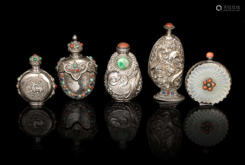 19th/20th century  A group of five silver-mounted hardstone and embellished silver snuff bottles