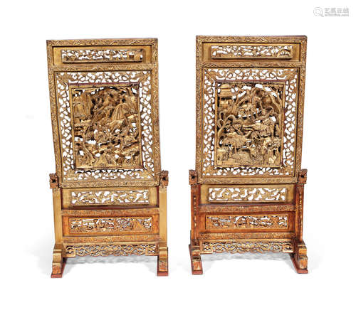 19th century A pair of carved gilt-wood 'Romance of the Three Kingdoms' table screens