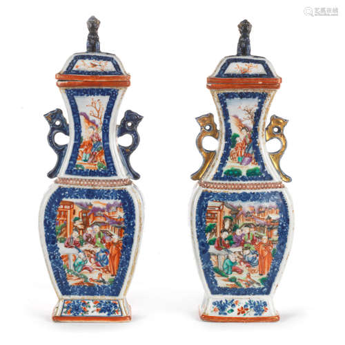 18th century A pair of square underglaze-blue and enamelled 'mandarin pattern' baluster vases and covers