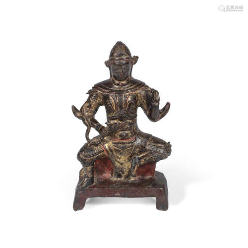 Ming Dynasty A gilt-lacquered bronze figure of Guandi