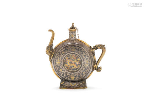 Tibet, 18th century A gold, silver and copper damascened ewer and cover