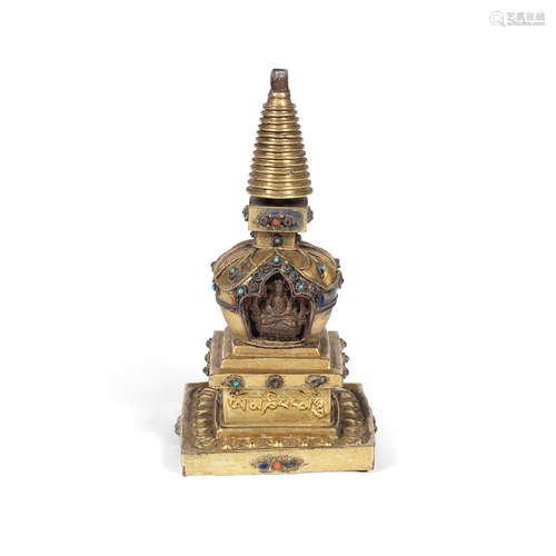 Tibet, 18th/19th century A hardstone-inset gilt copper-alloy repoussé stupa