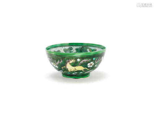 Kangxi A famille verte biscuit 'celestial horses' bowl