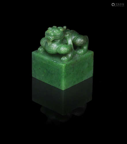 20th century A spinach green jade 'dragon' seal