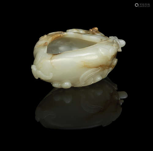 Qing Dynasty A green and russet jade peach-form brush washer