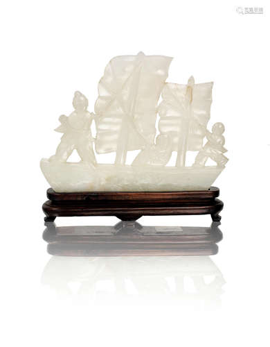 Late Qing Dynasty A white jade carving of a sail boat with three figures