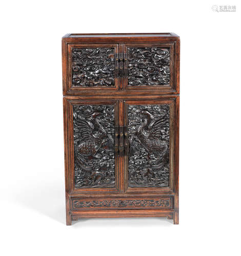 The inset panels 18th century, the cabinet 19th century A hongmu table cabinet with inset zitan panels