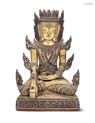 Burma, 19th/20th century A large gilt and papier-machéd wood figure of Buddha