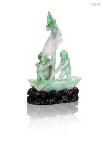 Late Qing Dynasty A jadeite carving of a sailing boat with figures