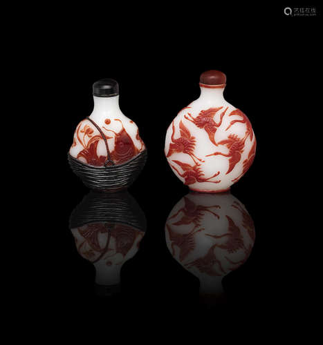 18th/19th century A red overlay glass 'fish basket' snuff bottle and a red overlay glass 'cranes' snuff bottle