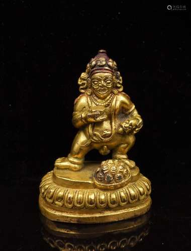 CHINESE GILT BRONZE FIGURE OF JAMBHALA