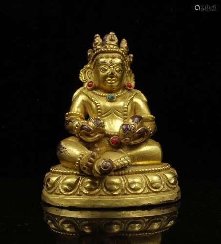 CHINESE GILT BRONZE FIGURE OF JAMBHALA