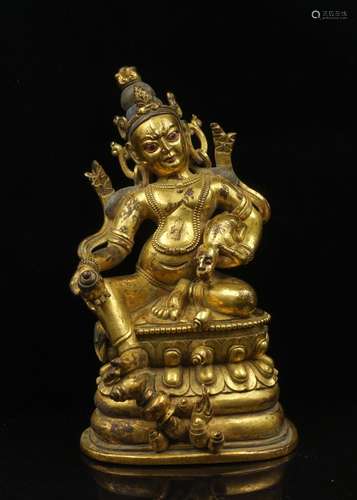 CHINESE GILT BRONZE FIGURE OF JAMBHALA