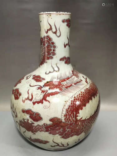 A DRAGON PATTERN UNDERGLAZED RED GLOBULAR BOTTLE