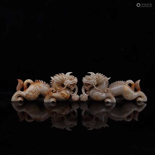 453-221BC, A PAIR OF DRAGON DESIGN HETIAN JADE ORNAMENTS, WARRING STATES