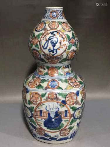 14-16TH CENTURY, A FIVE-COLOUR GROUND SHAPED BOTTLE, MING DYNASTY