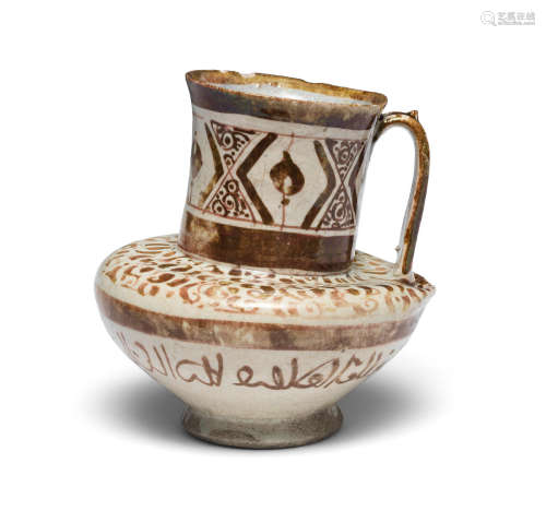A Kashan lustre pottery jug with filter Persia, 12th/ 13th Century