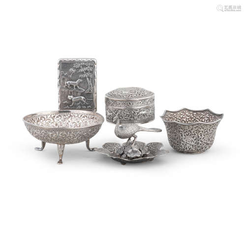 (5) A collection of repoussé silver by Oomersi Mawji Bhuj, 19th Century