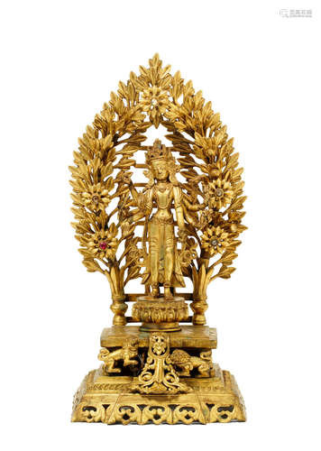 Nepal, dated 1892 and of the period An inscribed gilt-bronze figure of Amoghapasa