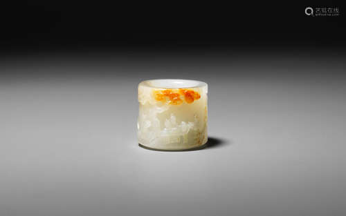 Mid-Qing Dynasty A white and russet jade thumb ring