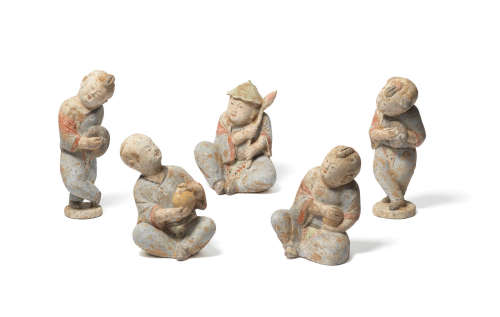 Tang Dynasty A set of five painted pottery figures of boys