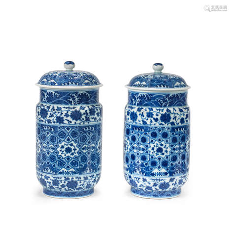 Qianlong A rare pair of Ming-style blue and white lantern-shaped jars and covers