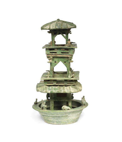 Eastern Han Dynasty A large green-glazed pottery three-storey watchtower
