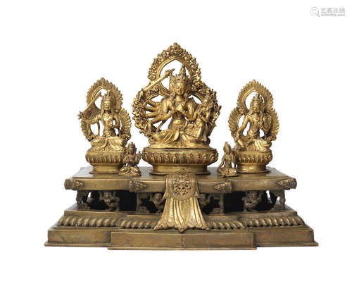 Nepal, dated 1832 and of the period A large gilt-bronze Buddhist Trinity group