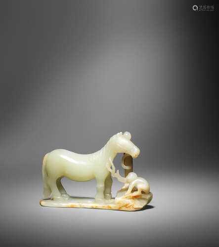 17th century A pale green and russet jade carving of a horse and monkey