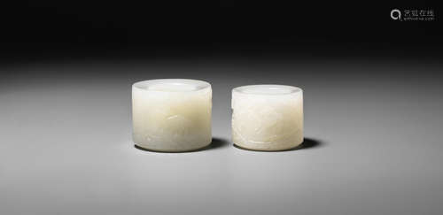 Mid-Qing Dynasty Two white jade 'deer' thumb rings