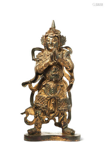 Ming Dynasty A gilt-lacquered bronze figure of weituo