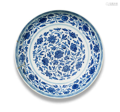 Yongzheng six-character mark and of the period A Ming-style blue and white 'floral scroll' dish