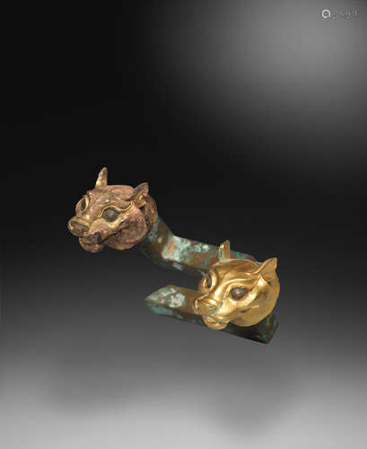 Qin Dynasty A rare pair of small gilt-bronze tiger-head terminals