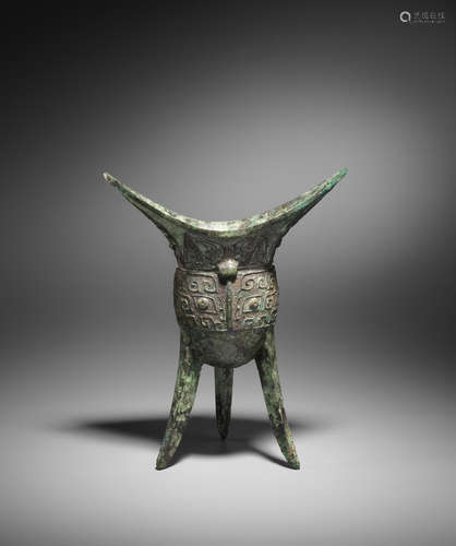 Late Shang Dynasty A very rare archaic bronze tripod vessel, Jiao