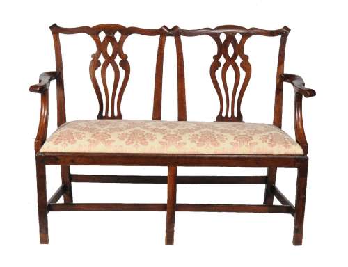 A George III mahogany double chair back settee