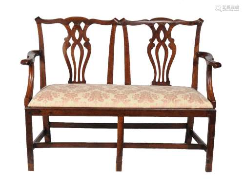 A George III mahogany double chair back settee