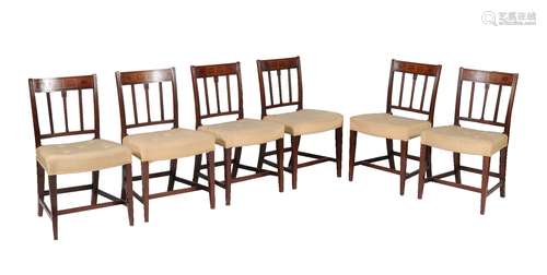 A set of eight George III mahogany and inlaid dining chairs