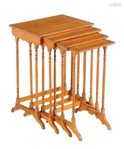 ϒ A nest of four satinwood and rosewood banded quartetto tables