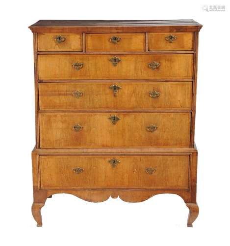 An oak and walnut chest on stand