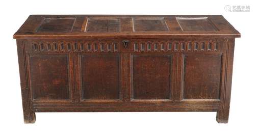 A Charles II oak four panel coffer