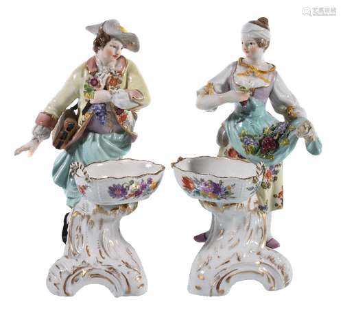 A pair of German porcelain figural table salts