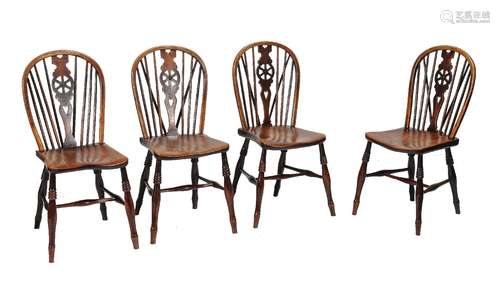 A set of four ash and elm Windsor chairs