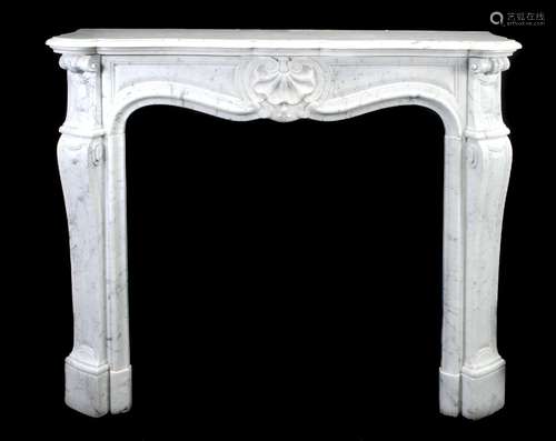 A variegated white marble chimneypiece in the Louis XV style