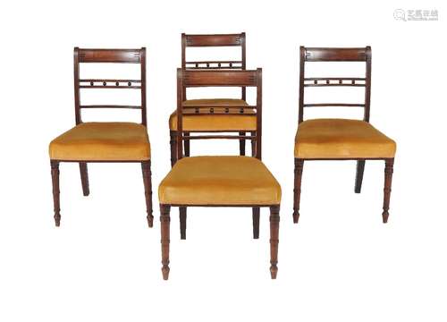 A set of nine Regency mahogany dining chairs